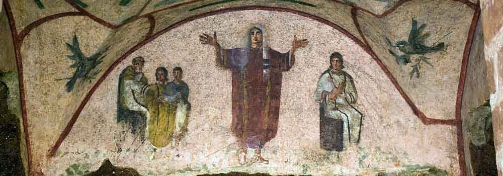 An image of a woman teaching or leading a religious ritual from St. Priscilla's catacombs in Rome.
